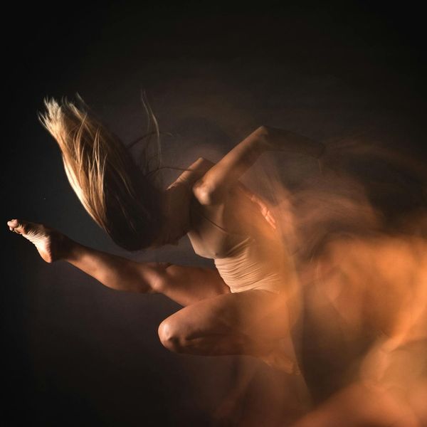 Abstract representation of energy flow and body flexibility.